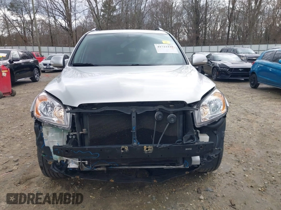2010 Toyota RAV4 Limited with VIN JTMDK4DV4A5084434, listed as a IAAI auction lot 41722239 with 156,836 mi miles and . Bid and sale history available at DreamBid. Image 6.
