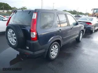 2006 Honda CR-V EX with VIN JHLRD788X6C011242, listed as a IAAI auction lot 41714756 with 199,074 mi miles. Bid and sale history available at carsss.com. Image 4.