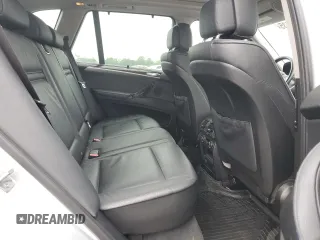 2012 BMW X5 35i with VIN 5UXZV4C57CL747717, listed as a Copart auction lot 63003135 with 135,999 mi miles and Clean title. Bid and sale history available at DreamBid. Image 11.