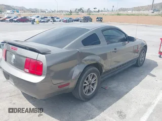 2005 Ford Mustang Deluxe with VIN 1ZVFT80N355185003, listed as a IAAI auction lot 42030961 with 219,973 mi miles. Bid and sale history available at carsss.com. Image 4.