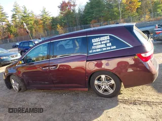 2012 Honda Odyssey Touring z VIN 5FNRL5H9XCB067841, wystawiony jako IAAI lot #40631672 z przebiegiem 210 237 mil mil oraz . Historia ofert i sprzedaży dostępna na DreamBid. Obrazek 15.