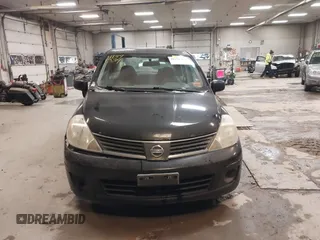 2007 Nissan Versa 1.8 SL with VIN 3N1BC11E47L411983, listed as a IAAI auction lot 41391334 with 201,830 mi miles. Bid and sale history available at carsss.com. Image 13.