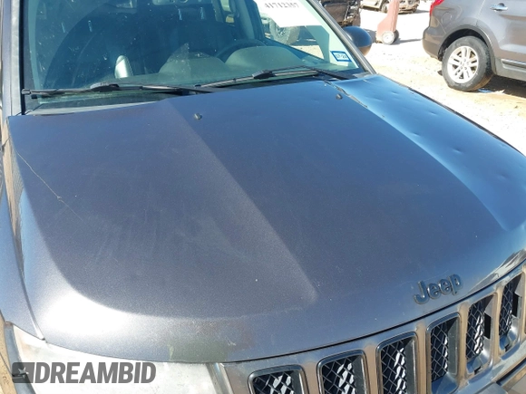 2014 Jeep Compass Sport with VIN 1C4NJCBA4ED880940, listed as a IAAI auction lot 41712357 with 156,171 mi miles. Bid and sale history available at carsss.com. Image 6.