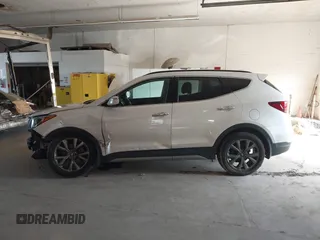 2017 Hyundai Santa Fe Ultimate with VIN 5XYZWDLA2HG491338, listed as a IAAI auction lot 42590671 with 114,521 mi miles and . Bid and sale history available at DreamBid. Image 15.