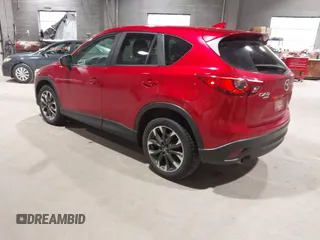 2016 Mazda CX-5 Grand Touring with VIN JM3KE4DY6G0690923, listed as a IAAI auction lot 41875553 with 179,489 mi miles. Bid and sale history available at carsss.com. Image 3.
