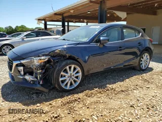 2017 Mazda 3 Grand Touring z VIN JM1BN1M36H1140452, wystawiony jako Copart lot #57821325 z przebiegiem 136 536 mil mil oraz Szkoda całkowita • Salvage title. Historia ofert i sprzedaży dostępna na DreamBid. Obrazek 1.