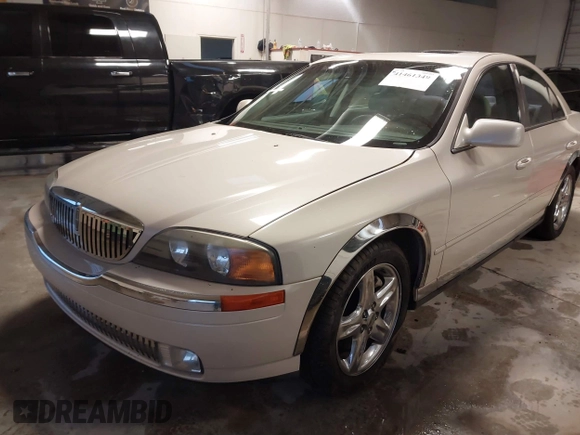 2002 Lincoln LS w/Base Pkg z VIN 1LNHM87AX2Y620293, wystawiony jako IAAI lot #41461349 z przebiegiem 129 295 mil mil oraz . Historia ofert i sprzedaży dostępna na DreamBid. Obrazek 17.