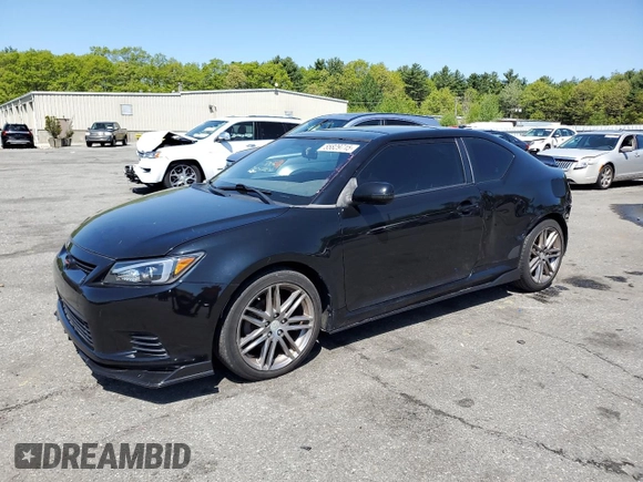 2011 Scion tC z VIN JTKJF5C70B3016542, wystawiony jako Copart lot #55829715 z przebiegiem 99 791 mil mil oraz Szkoda całkowita • Salvage title. Historia ofert i sprzedaży dostępna na DreamBid. Obrazek 1.