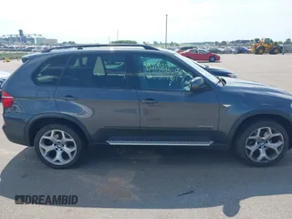2012 BMW X5 35d with VIN 5UXZW0C56CL664575, listed as a IAAI auction lot 42559674 with 157,554 mi miles and . Bid and sale history available at DreamBid. Image 13.