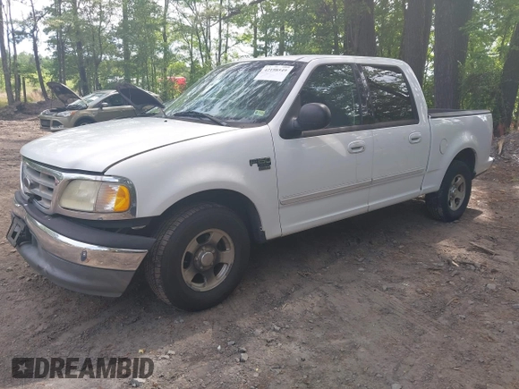 2003 Ford F-150 XLT with VIN 1FTRW07663KD69809, listed as a IAAI auction lot 42198549 with 166,466 mi miles and . Bid and sale history available at DreamBid. Image 2.