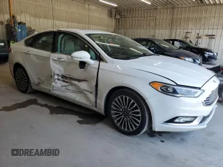 2017 Ford Fusion Hybrid Titanium z VIN 3FA6P0RU3HR400034, wystawiony jako Copart lot #62689795 z przebiegiem 109 118 mil mil oraz Szkoda całkowita • Salvage title. Historia ofert i sprzedaży dostępna na DreamBid. Obrazek 4.