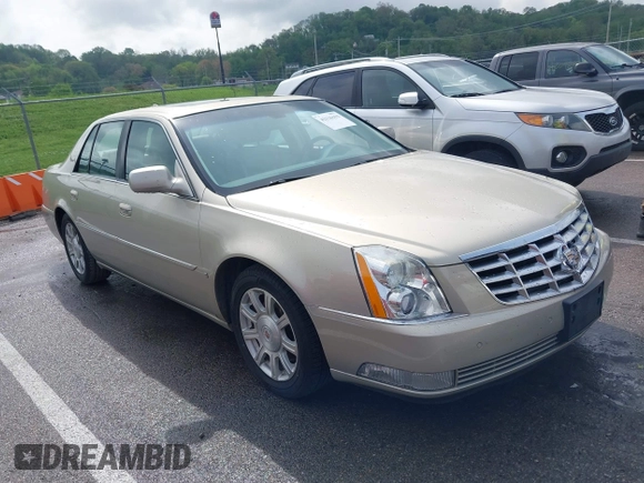 2009 Cadillac DTS 1SA z VIN 1G6KD57Y19U127449, wystawiony jako IAAI lot #42116152 z przebiegiem 107 901 mil mil oraz . Historia ofert i sprzedaży dostępna na DreamBid. Obrazek 1.