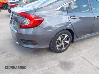 2020 Honda Civic LX with VIN 2HGFC2F65LH575320, listed as a IAAI auction lot 42009564 with Not Provided miles and . Bid and sale history available at DreamBid. Image 4.