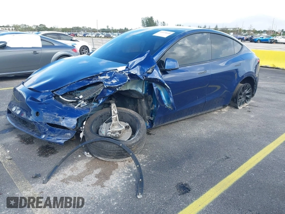 2021 Tesla Model Y Standard Range with VIN 5YJYGDED4MF112857, listed as a IAAI auction lot 41134600 with Not Provided miles and . Bid and sale history available at DreamBid. Image 18.