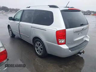 2014 Kia Sedona EX with VIN KNDMH4C76E6541200, listed as a IAAI auction lot 41657002 with 141,377 mi miles. Bid and sale history available at carsss.com. Image 3.