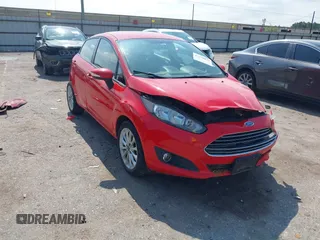 2014 Ford Fiesta SE z VIN 3FADP4EJ0EM191399, wystawiony jako IAAI lot #42170433 z przebiegiem 159 358 mil mil oraz . Historia ofert i sprzedaży dostępna na DreamBid. Obrazek 1.