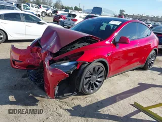 2024 Tesla Model Y Performance with VIN 7SAYGDEF3RF032980, listed as a IAAI auction lot 41619450 with 12,105 mi miles and . Bid and sale history available at DreamBid. Image 2.
