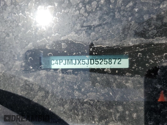 2018 Jeep Cherokee Overland with VIN 1C4PJMJX5JD525872, listed as a Copart auction lot 53783655 with 112,396 mi miles and Salvage title. Bid and sale history available at DreamBid. Image 13.