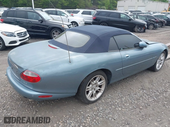 2002 Jaguar XK with VIN SAJDA42CX2NA28816, listed as a IAAI auction lot 42029672 with 130,978 mi miles and . Bid and sale history available at DreamBid. Image 4.