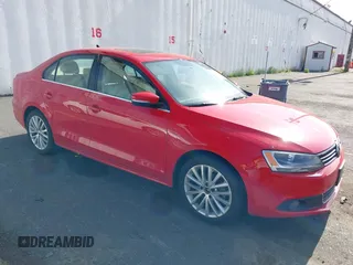 2014 Volkswagen Jetta TDI w/Premium with VIN 3VWLL7AJ8EM372627, listed as a IAAI auction lot 42418054 with 119,926 mi miles and . Bid and sale history available at DreamBid. Image 1.