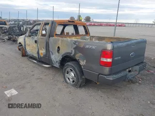 2005 Ford F-150 STX with VIN 1FTRX12W55NA60523, listed as a IAAI auction lot 41106389 with 1 mi miles. Bid and sale history available at carsss.com. Image 3.