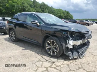 2020 Lexus RX 350 with VIN 2T2HZMDA8LC216493, listed as a Copart auction lot 61396315 with 43,650 mi miles and Salvage title. Bid and sale history available at DreamBid. Image 4.