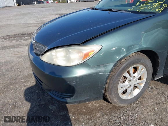 2004 Toyota Camry LE with VIN 4T1BF32K04U074276, listed as a IAAI auction lot 41940050 with 266,420 mi miles and . Bid and sale history available at DreamBid. Image 6.