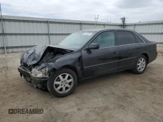 2000 Toyota Avalon XL with VIN 4T1BF28B4YU105732, listed as a Copart auction lot 54752665 with 143,855 mi miles and Salvage Title. Bid and sale history available at DreamBid. Image 1.
