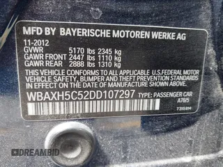 2013 BMW 5 Series 528i xDrive with VIN WBAXH5C52DD107297, listed as a IAAI auction lot 42004619 with 182,805 mi miles. Bid and sale history available at carsss.com. Image 9.