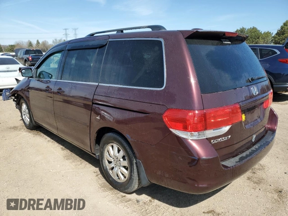 2010 Honda Odyssey EX-L with VIN 5FNRL3H60AB041353, listed as a Copart auction lot 52801315 with 120,253 mi miles and Salvage Title. Bid and sale history available at DreamBid. Image 2.
