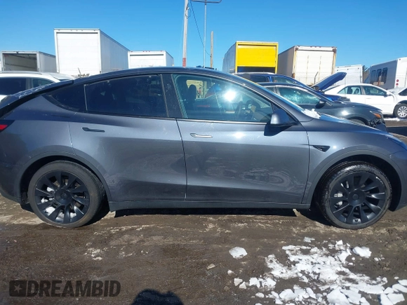 2023 Tesla Model Y Long Range with VIN 7SAYGAEE9PF905943, listed as a IAAI auction lot 41444255 with 11,179 mi miles and . Bid and sale history available at DreamBid. Image 12.