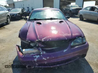 1997 Ford Mustang Cobra with VIN 1FALP47V0VF117976, listed as a Copart auction lot 72975454 with 165,076 mi miles and Salvage Title. Bid and sale history available at carsss.com. Image 5.
