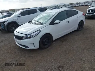 2017 Kia Forte LX with VIN 3KPFK4A71HE017819, listed as a IAAI auction lot 42086163 with 97,534 mi miles. Bid and sale history available at carsss.com. Image 2.