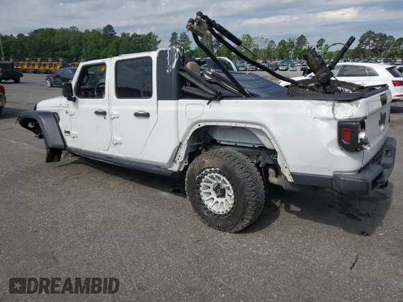 2020 Jeep Gladiator Sport S with VIN 1C6HJTAG5LL109304, listed as a Copart auction lot 55290145 with 83,771 mi miles and Salvage title. Bid and sale history available at DreamBid. Image 2.