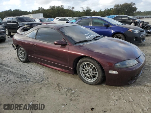 1999 Mitsubishi Eclipse with VIN 4A3AK44Y7XE104372, listed as a Copart auction lot 78361734 with 112,595 mi miles and Salvage Title. Bid and sale history available at DreamBid. Image 4.
