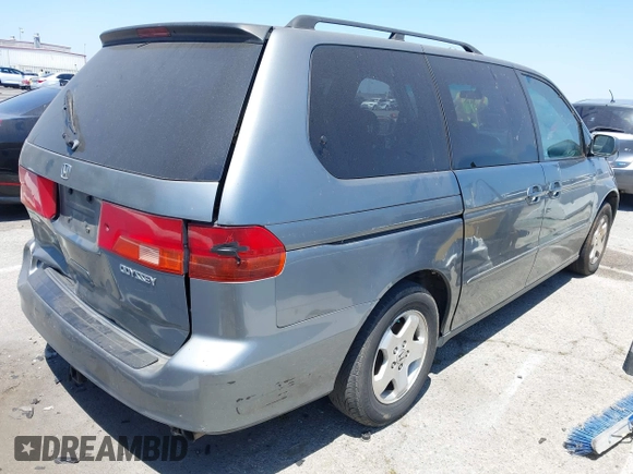1999 Honda Odyssey EX z VIN 2HKRL1861XH549362, wystawiony jako IAAI lot #42400965 z przebiegiem 193 403 mil mil oraz . Historia ofert i sprzedaży dostępna na DreamBid. Obrazek 4.