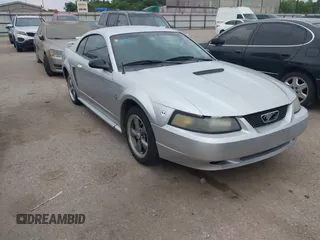 2002 Ford Mustang Standard z VIN 1FAFP40462F102098, wystawiony jako IAAI lot #42195777 z przebiegiem Nie podano mil oraz . Historia ofert i sprzedaży dostępna na DreamBid. Obrazek 1.