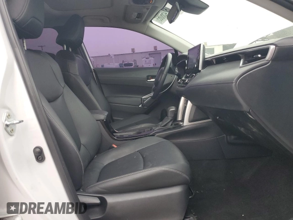 2022 Toyota Corolla Cross XLE with VIN 7MUDAAAG6NV014706, listed as a Copart auction lot 52456065 with 31,041 mi miles and Salvage title. Bid and sale history available at DreamBid. Image 7.