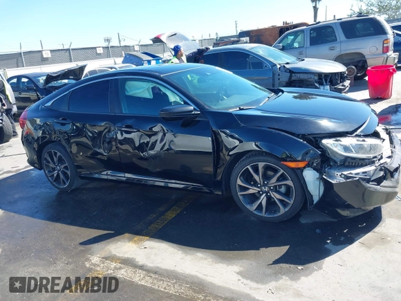 2021 Honda Civic Sport with VIN 2HGFC2F81MH529499, listed as a IAAI auction lot 41836215 with 55,833 mi miles and . Bid and sale history available at DreamBid. Image 13.