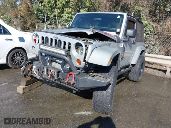 2011 Jeep Wrangler Rubicon with VIN 1J4BA6D10BL514776, listed as a IAAI auction lot 41487396 with 172,208 mi miles. Bid and sale history available at carsss.com. Image 18.