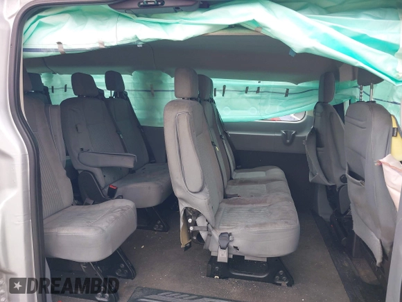 2018 Ford Transit Passenger XL z VIN 1FBZX2ZM2JKB02141, wystawiony jako IAAI lot #41914073 z przebiegiem 103 718 mil mil oraz . Historia ofert i sprzedaży dostępna na DreamBid. Obrazek 8.