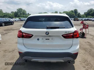 2017 BMW X1 xDrive28i with VIN WBXHT3Z3XH4A55624, listed as a Copart auction lot 59773545 with 140,251 mi miles and Salvage title. Bid and sale history available at DreamBid. Image 6.