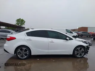 2016 Kia Forte EX with VIN KNAFX4A82G5450616, listed as a IAAI auction lot 42107042 with 131,419 mi miles. Bid and sale history available at carsss.com. Image 14.