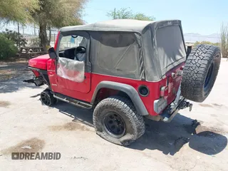 2000 Jeep Wrangler Sport with VIN 1J4FA49S0YP731544, listed as a IAAI auction lot 42570831 with Not provided miles and . Bid and sale history available at DreamBid. Image 3.