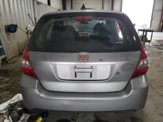 2007 Honda Fit with VIN JHMGD38437S002477, listed as a Copart auction lot 72065034 with 59,192 mi miles and Salvage Title. Bid and sale history available at carsss.com. Image 6.