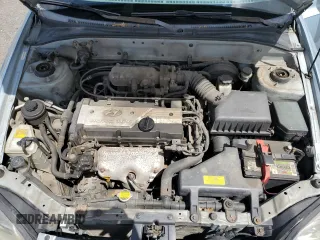 2004 Hyundai Accent GL z VIN KMHCG45C94U574027, wystawiony jako Copart lot #57463905 z przebiegiem 139 595 mil mil oraz Szkoda całkowita • Salvage title. Historia ofert i sprzedaży dostępna na DreamBid. Obrazek 11.