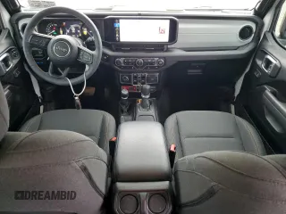 2024 Jeep Wrangler Sport S with VIN 1C4RJXN68RW283543, listed as a Copart auction lot 57752525 with 4,334 mi miles and Salvage title. Bid and sale history available at DreamBid. Image 8.
