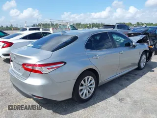 2019 Toyota Camry LE with VIN 4T1B11HK4KU249720, listed as a IAAI auction lot 41940728 with 35,891 mi miles and . Bid and sale history available at DreamBid. Image 4.
