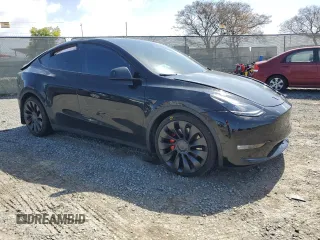2022 Tesla Model Y Performance with VIN 7SAYGDEF5NF443274, listed as a Copart auction lot 49581905 with Not provided miles and Salvage title. Bid and sale history available at DreamBid. Image 4.
