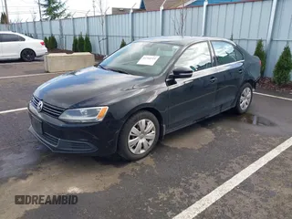 2013 Volkswagen Jetta Sedan SE w/Convenience/Sunroof with VIN 3VWDX7AJ2DM373165, listed as a IAAI auction lot 41710725 with 168,036 mi miles. Bid and sale history available at carsss.com. Image 2.